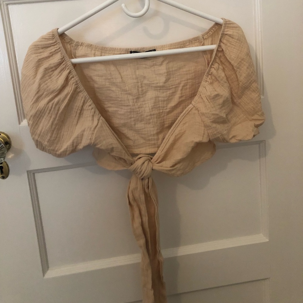 Tan tie in from crop top